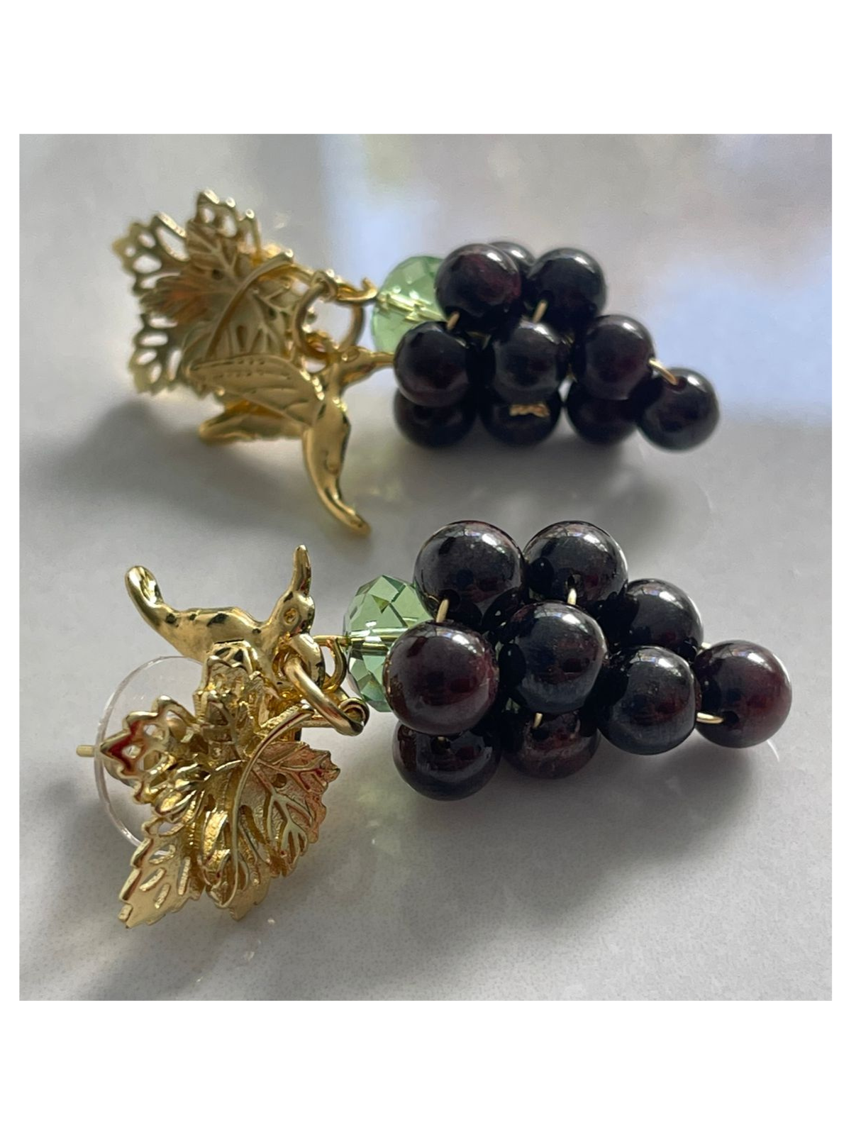 
                  
                    Aretes "Vuelo del Colibrí" – Pionero Tinto
                  
                